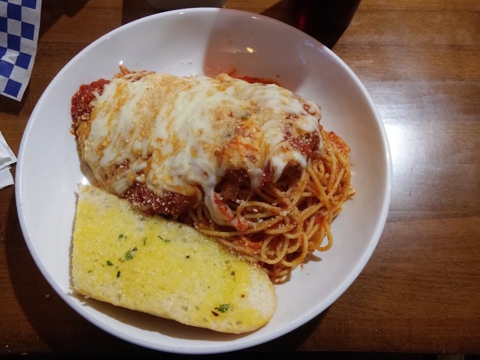 Dessert and pasta selections on a restaurant menu.